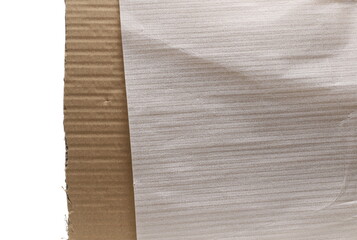Cardboard covered with protective styrofoam wrapping, isolated on white background and texture
