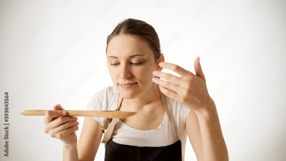 Canvas Prints girl cook trying food