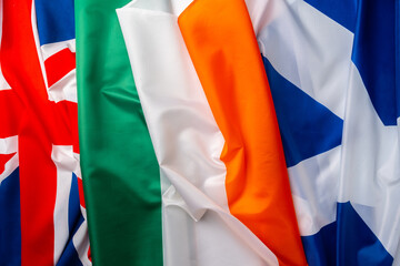 Flags of UK, Ireland and Scotland folded together