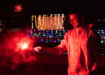 A person celebrating festival of sparkling lights and colors .... Diwali