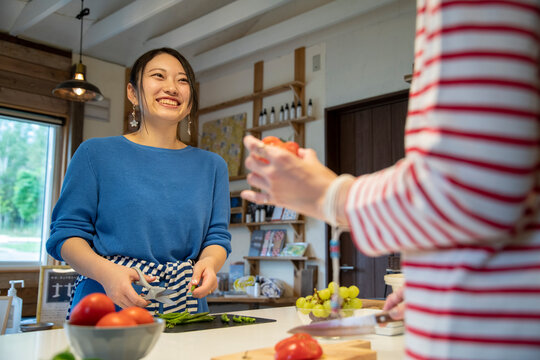 Women Cooking in the Shared Kitchen