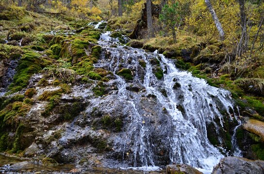 Pictures of a waterfall located in the taiga, in Gorny Altai, Russia.