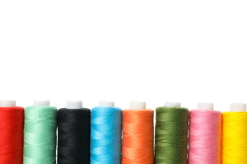 Color thread spools isolated on white background