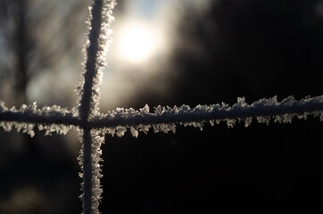 frosted football net closeup, ice