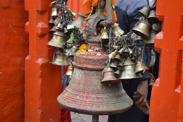 bells hanging outside of a temple