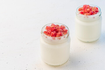 Pomegranate with natural yogurt