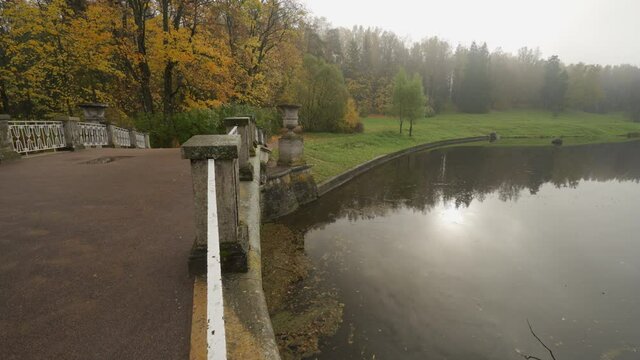 Pavlovsk park in autumn, St. Petersburg, Visconti bridge spanning the Slavianka river