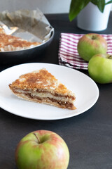 Homemade apple pies on dark background. Autumn dessert.