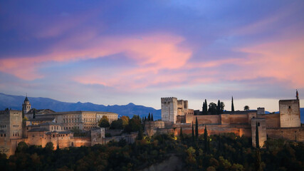 Fototapeta na wymiar Panoramic view of Alhambra in Granada, Spain. Alhambra fortress and Albaicin quarter at twilight sky scene-Autumn season mood