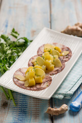 octopus carpaccio with potatoes parsley and ginger