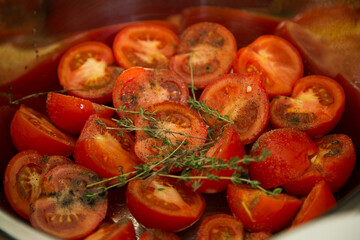 harvesting of tomatoes for roasting on the grill closeup