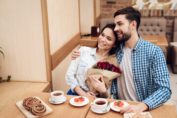 Happy Young Couple Have Date in Modern Cafeteria.