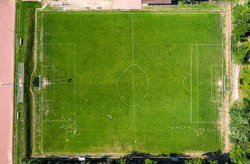 funny aerial view of soccer field - obrazy, fototapety, plakaty