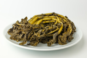 Trimmed radish stems on a white background