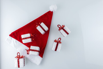 Santa's red hat and Christmas gifts