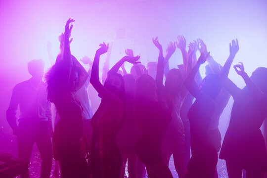 Photo Of People Pretty Flirty Girls Dance Raise Hands Party Event Wear Stylish Outfit Glossy Dress Modern Club Indoors