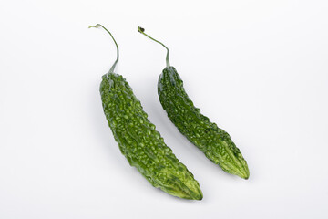 two fresh bitter melon on white background