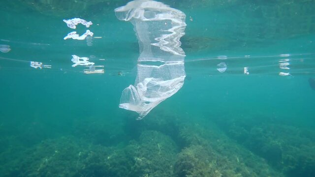 Ecological problems in ocean with plastic and plastic bags