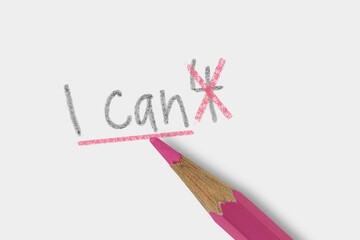 The phrase I can't corrected with pink pencil on white background - Concept of women and self belief