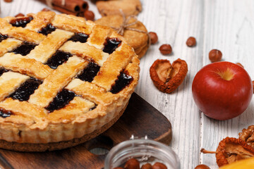 Naklejka na ściany i meble Berry tart pie on white wooden table