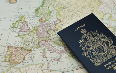 canada passport on a geographical map of Europe
