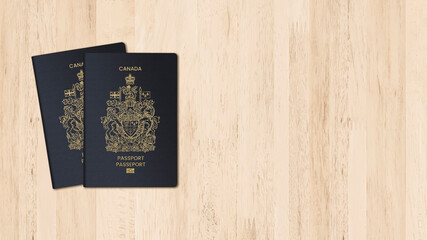 Canada passport on a wooden background, space for texts
