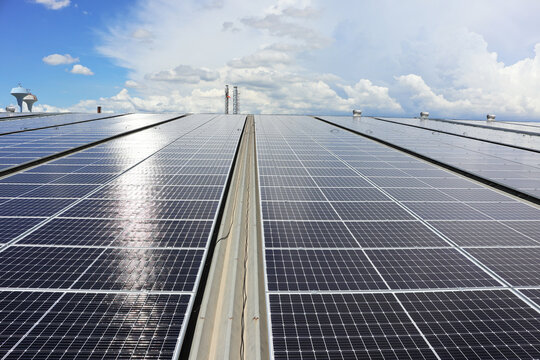 Solar PV System on Industry Roof with Cloudy Sky