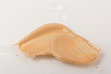 Texture of liquid foundation Background made of liquid foundation Make-up concept
