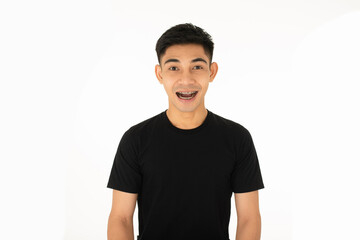 Portrait of Young asian  man with dental braces