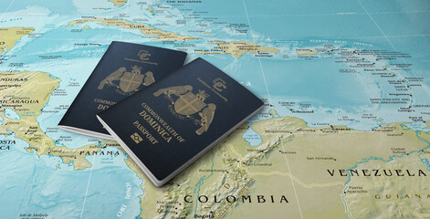 Two Dominica passports on a map of the Caribbean Sea and Central America