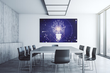 Creative light bulb with chip hologram on presentation monitor in a modern boardroom, artificial Intelligence and neural networks concept. 3D Rendering