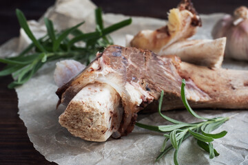 Beef bone and vegetable ingredients for cooking broth. Healthy food with collagen and amino acids. Copy space.