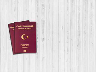 Turkey passport on a wooden background, space for texts