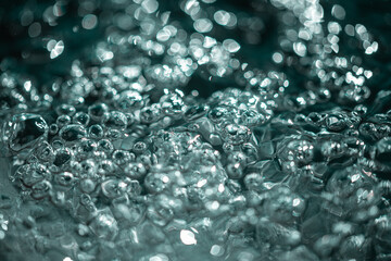 air bubbles on water surface, close view 