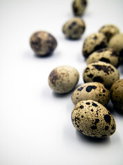 quail eggs on white background