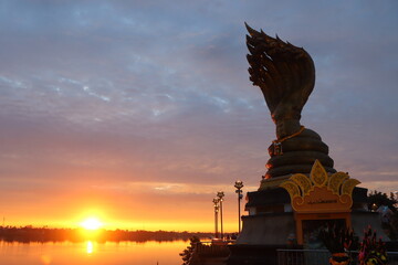 Long morning sunrise along the Mekong River bank At the Sisattanakaraj Square