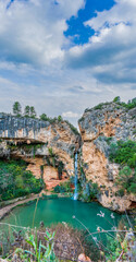 Top view of Turche cave and waterfall under the clouds in Valencia