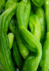 crumpled green peppers
