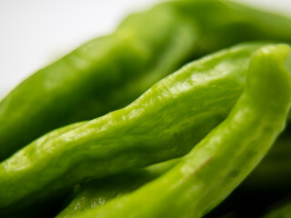 crumpled green peppers