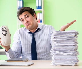 Fototapeta premium Businessman having problems with paperwork and workload