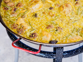 cooking paella, typical spanish food