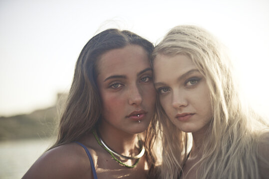 portrait of two young women at the beach