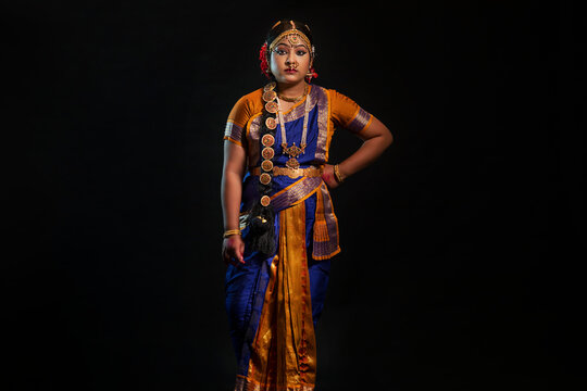 Portrait of a Kuchipudi dancer lost in thought	