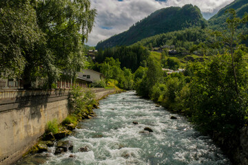 Fototapeta premium Rio Bravo descends from the mountains and empties into a Norwegian fjord