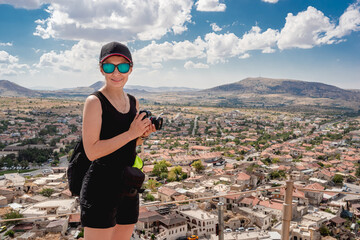 Woman standing on view point above Cappadocia