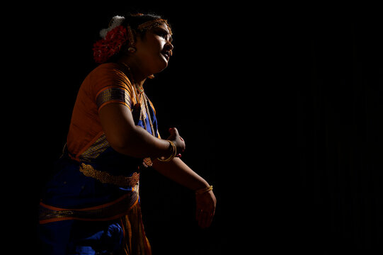 Kuchipudi dancer showing Karuna rasa in her performance	