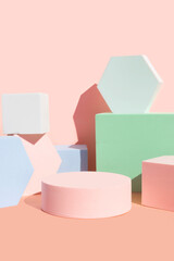 coral pink podium with geometric shapes background pastel colored stage