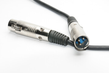 Audio cable with XLR connectors for microphones and professional audio equipment on a white background