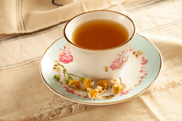 dried daisies and chamomile tea