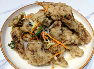 fresh fried pork in scoop 